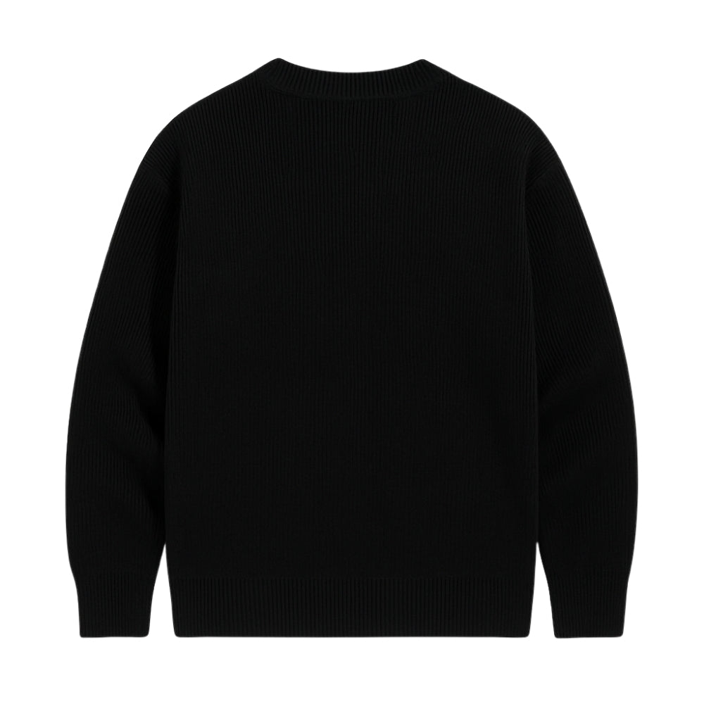 'monochrome,' 'intarsia knit,' 'geometric pattern,' 'heavyweight wool,' and 'statement piece