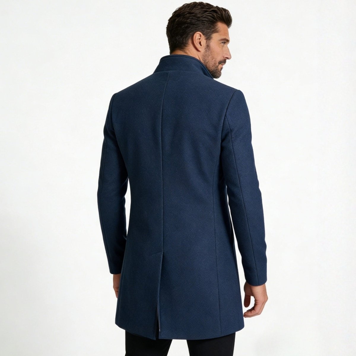 Back view of the Kouvr Fashion men's blue wool overcoat showing the clean tailoring and single center vent.