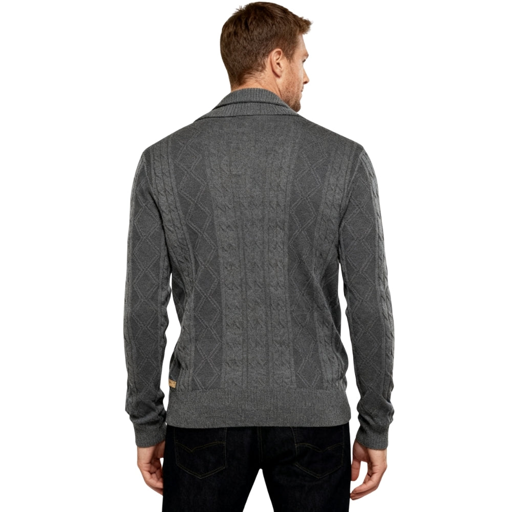 Man wearing a gray kouvr patterned sweater on a white background