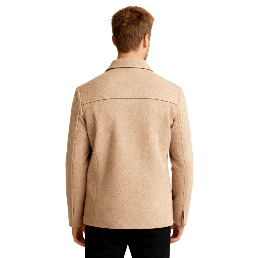 A man wearing the Kouvr Fashion khaki herringbone wool jacket over a white turtleneck, showcasing a smart casual look