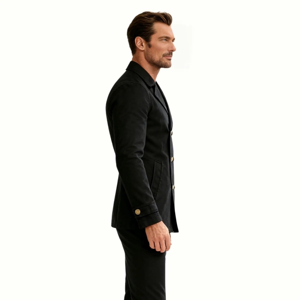 Side view of the Kouvr Fashion men's black pea coat showcasing its tailored silhouette and sleeve cuff button detail.