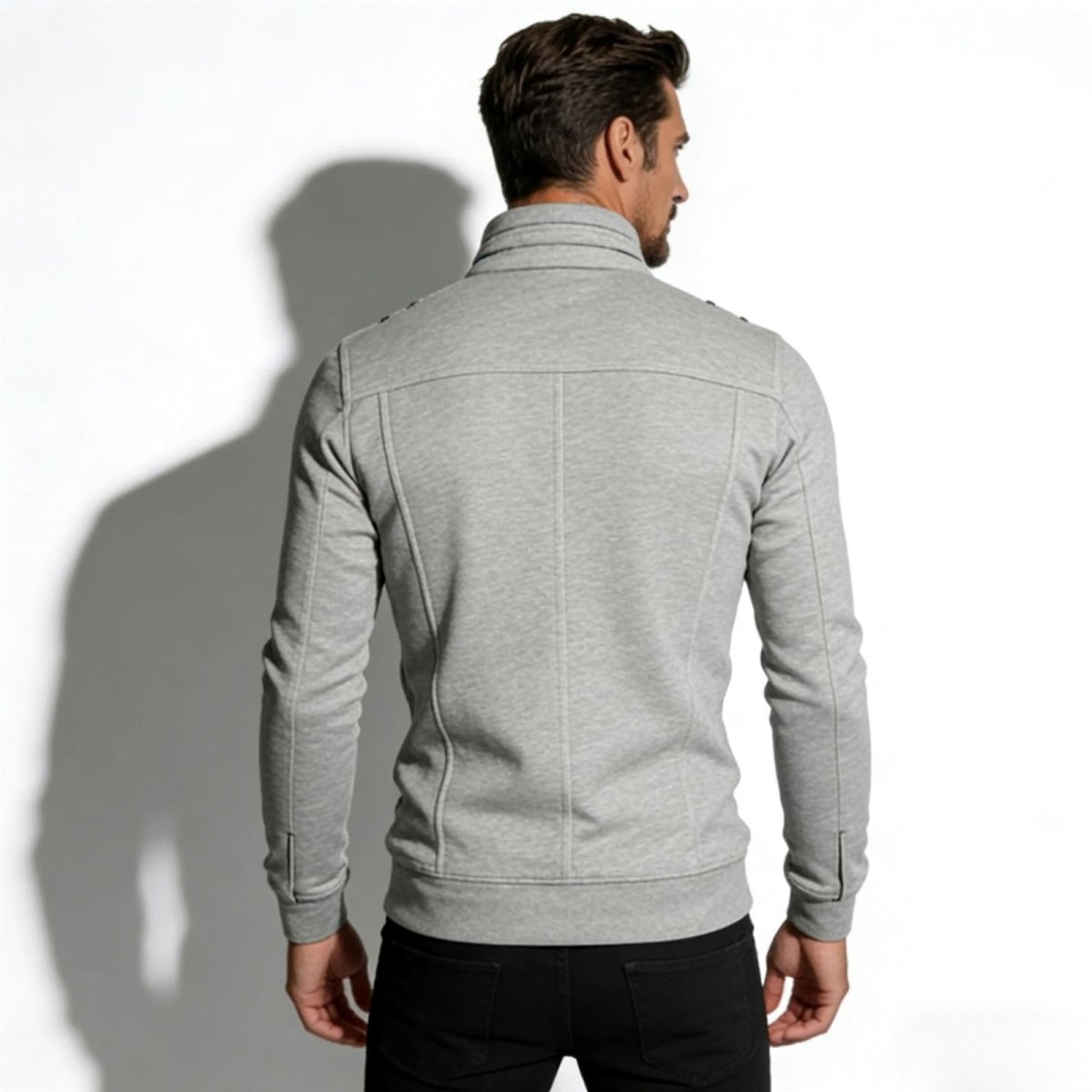 Back detail of the Kouvr men's heather grey military jacket, highlighting the panel stitching and clean lines.
