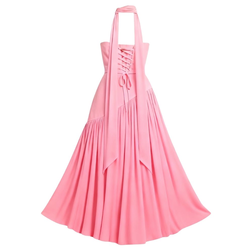 Pink Kouvr dress with a halter neck on a white background