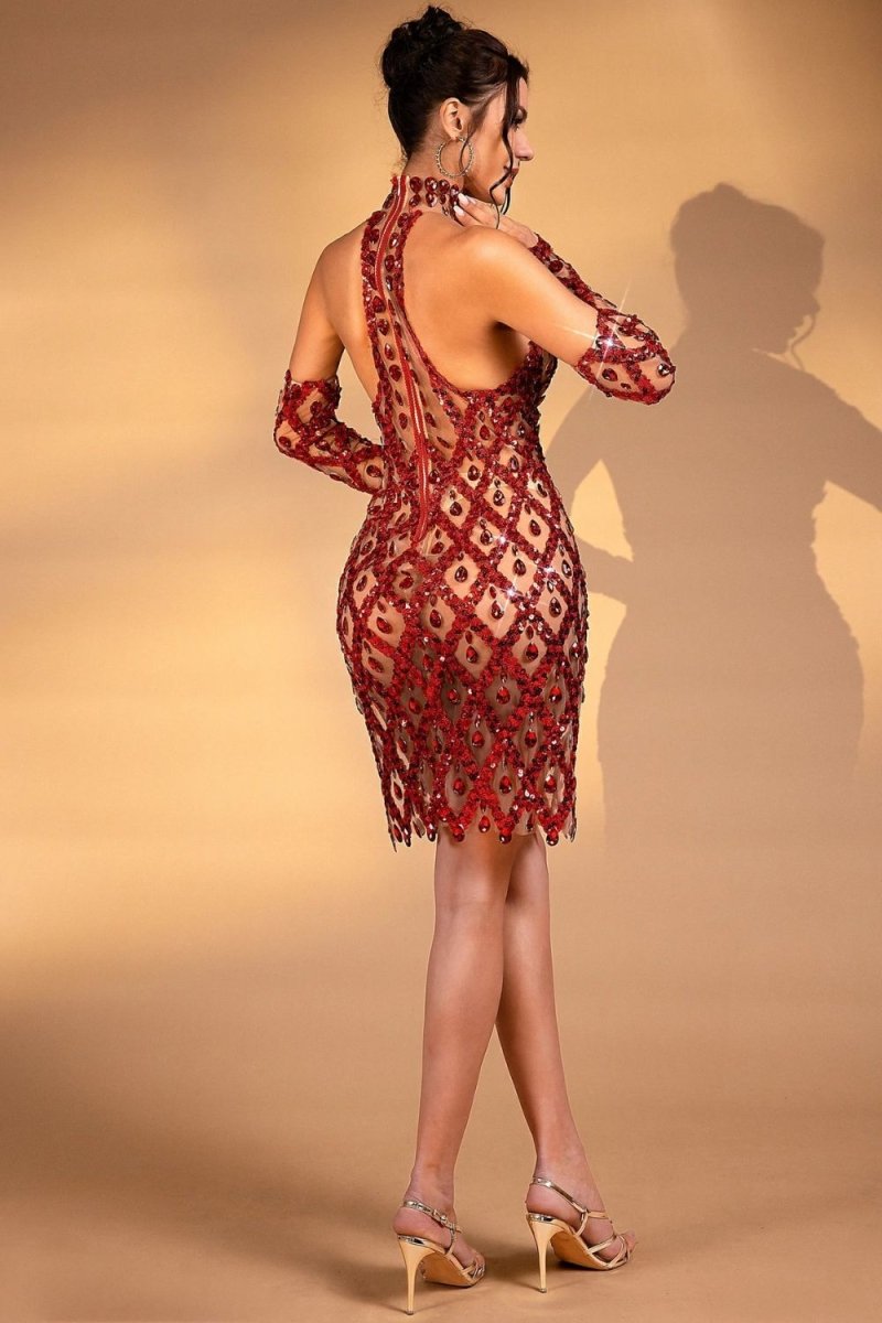 Model wearing the Kouvr Fashion red crystal embellished sheer halter mini dress