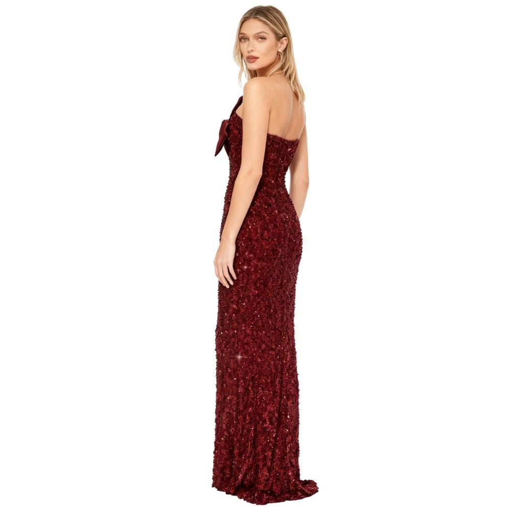 Red Kouvr sparkly evening gown on a white background