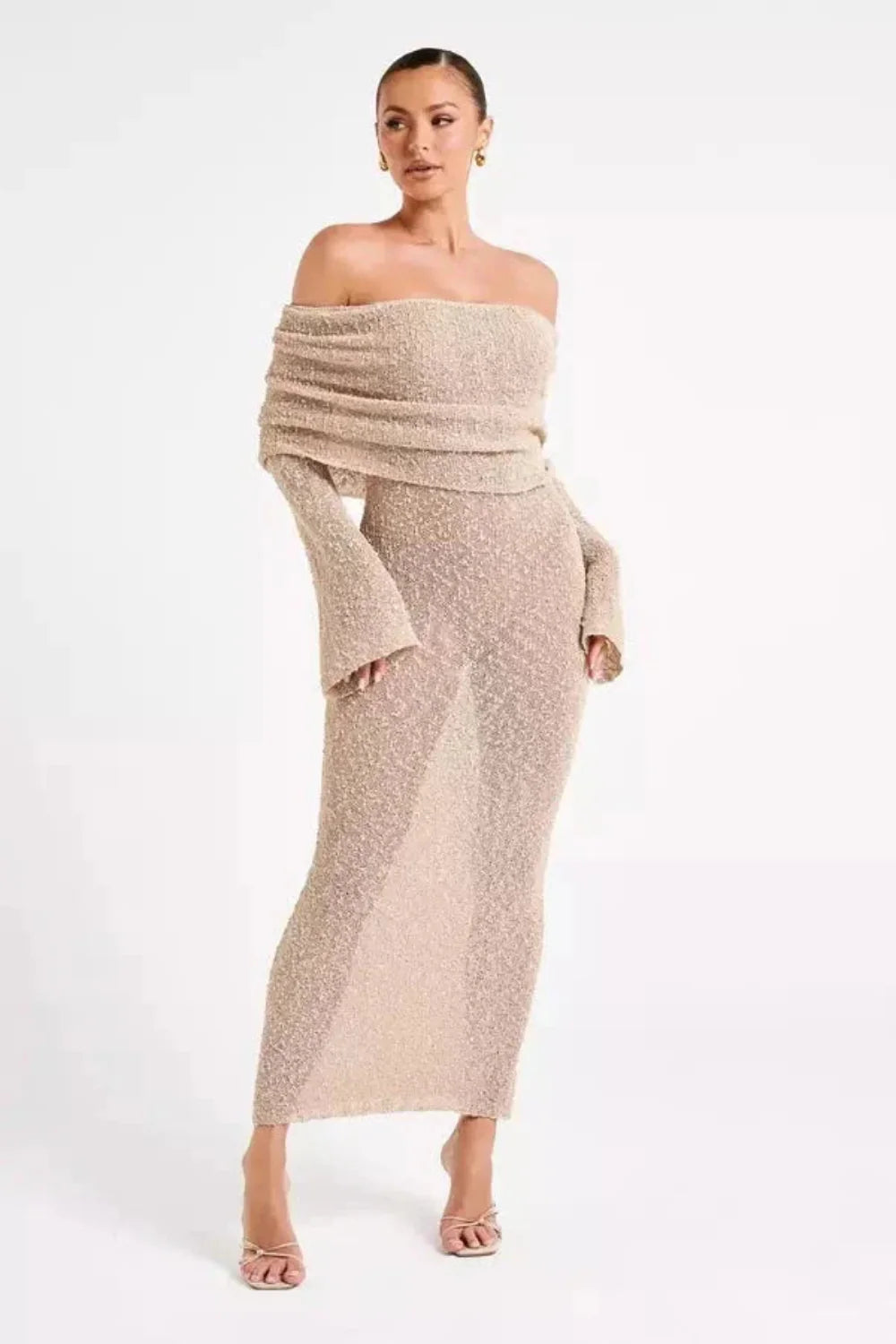 Model wearing the Kouvr Selah off-shoulder knit maxi dress in beige sand