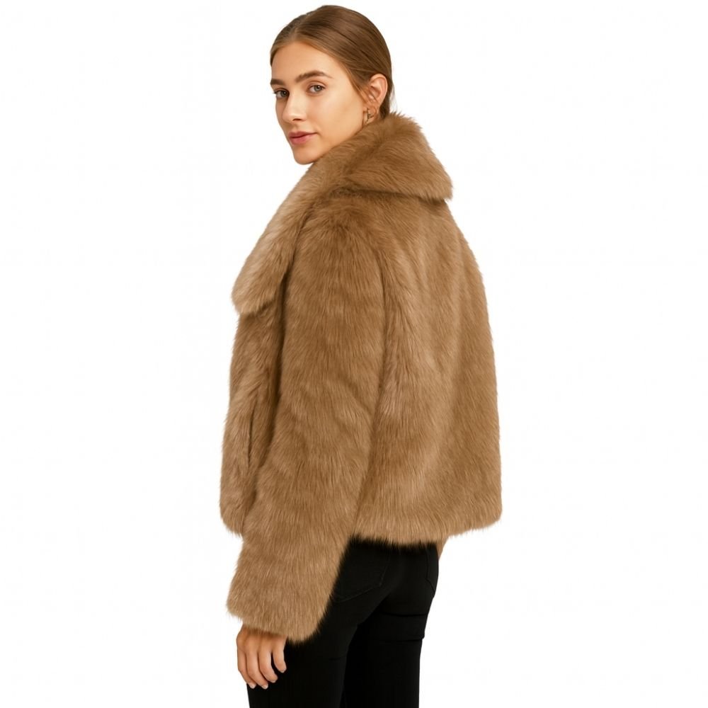 cruelty-free outerwear," "plush texture," "statement coat," "fall/winter essential," and "investment piece