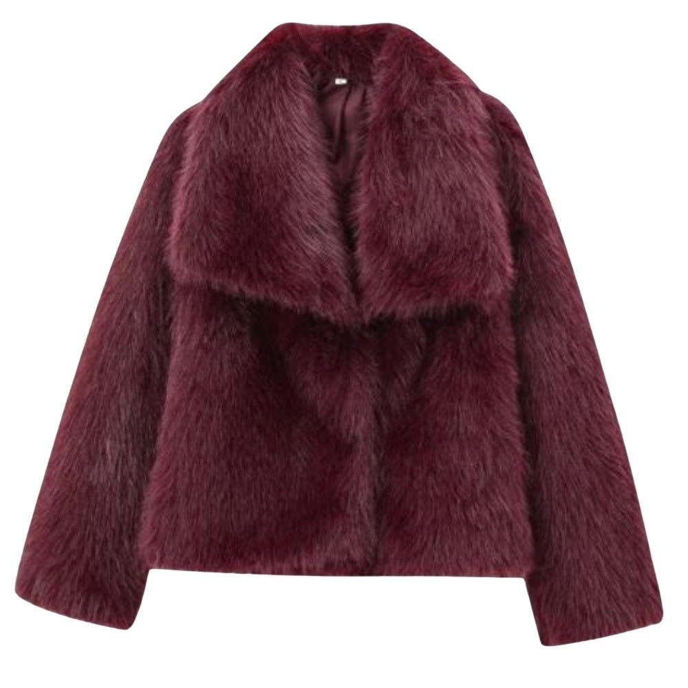 Model wearing the Kouvr Fashion Bordeaux oversized burgundy faux fur coat with a white top and blue jeans