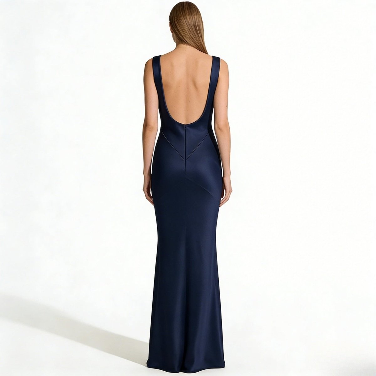 Back view of the Vickie navy satin evening gown, showcasing the dramatic low scoop back and elegant floor-length train.