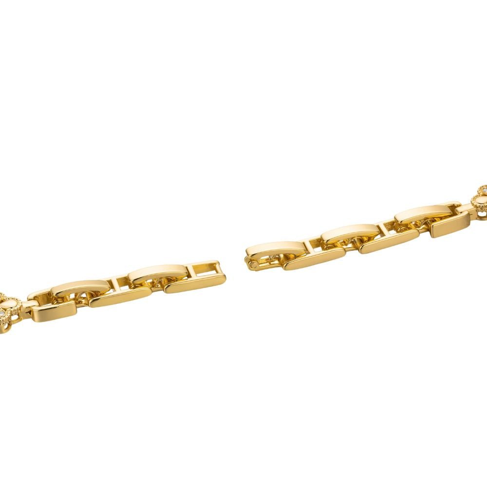 Gold Kouvr bracelet on a white background