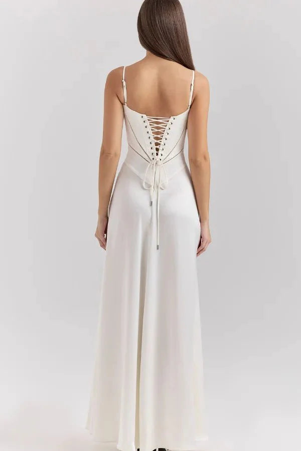 Model wearing the Kouvr Gabriella ivory silk corset back bridal gown.