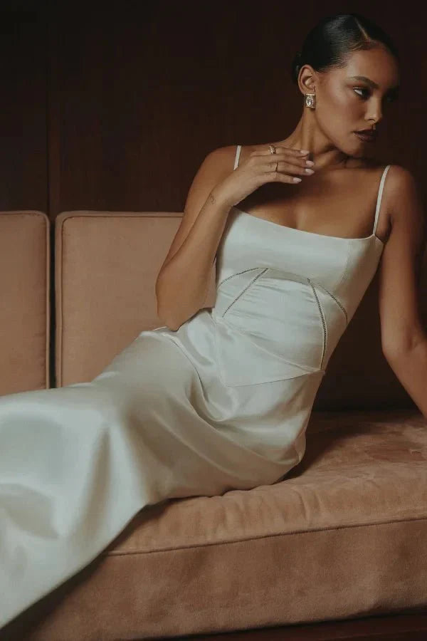 Model wearing the Kouvr Gabriella ivory silk corset back bridal gown.