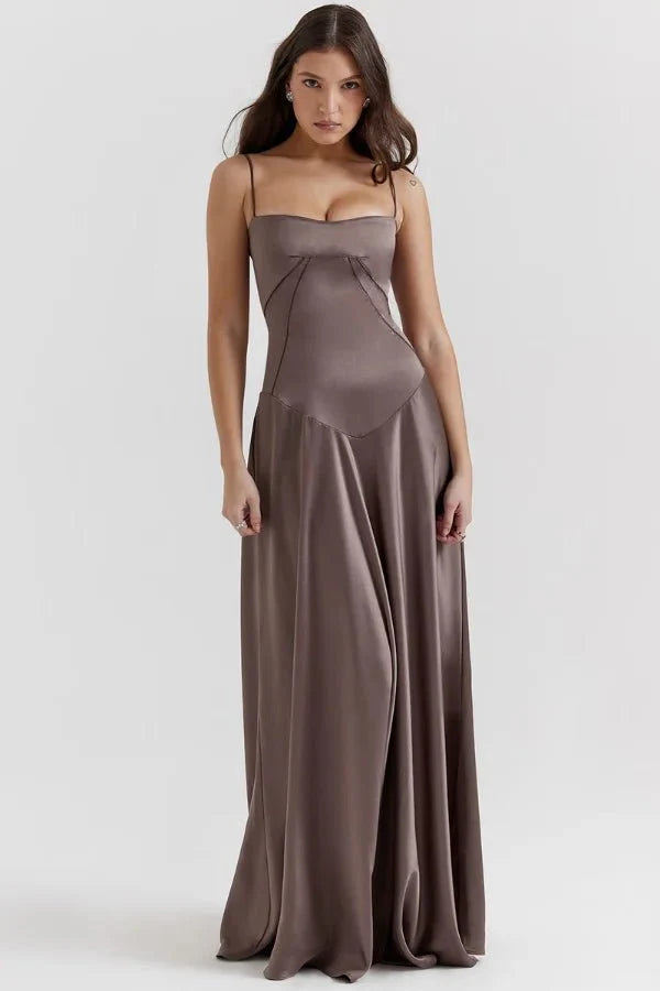 Kouvr Gabriella Gown in Mocha: a brown satin corset maxi dress with a lace-up back, worn by a model.