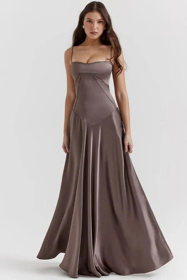 Kouvr Gabriella Gown in Mocha: a brown satin corset maxi dress with a lace-up back, worn by a model.