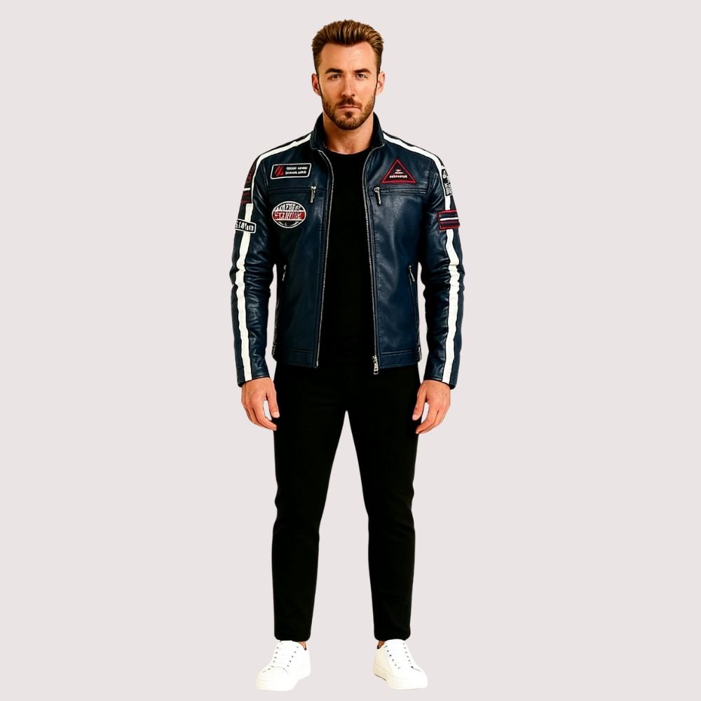 Man wearing the Kouvr Jayce Men's Navy Blue Leather Racer Jacket with embroidered patches and white