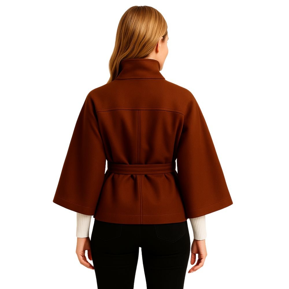 Model from the back wearing the Kouvr Jaye Belted Cape Jacket in Brown, showcasing the wide sleeves and tie-waist detail