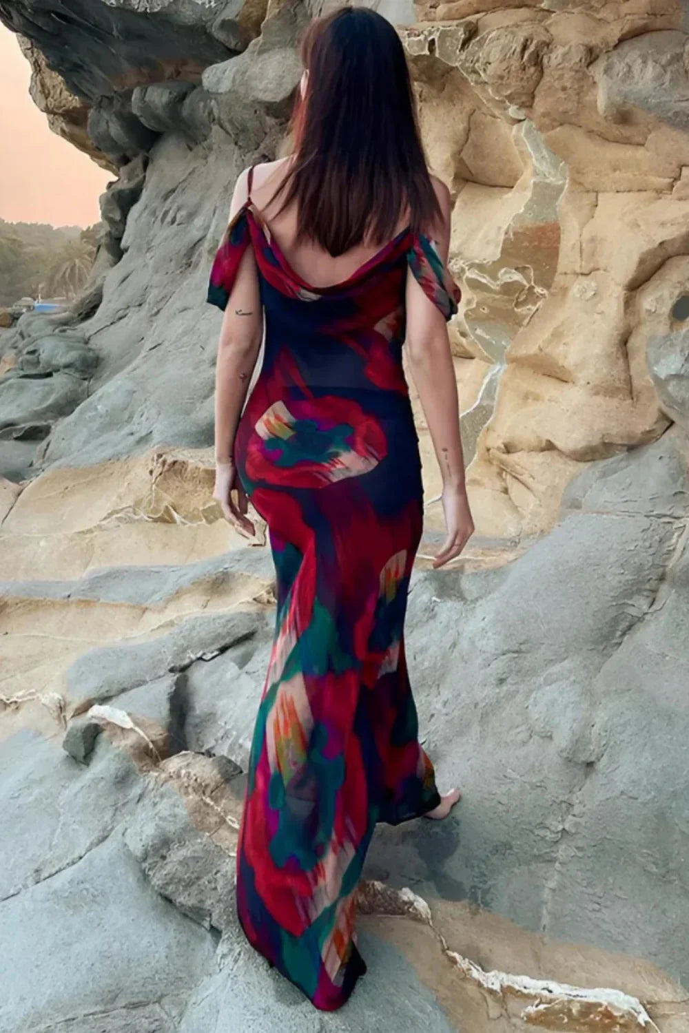 long flowing formal gown," "elegant off the shoulder dress," "cowl neck summer dress," "luxury resort wear