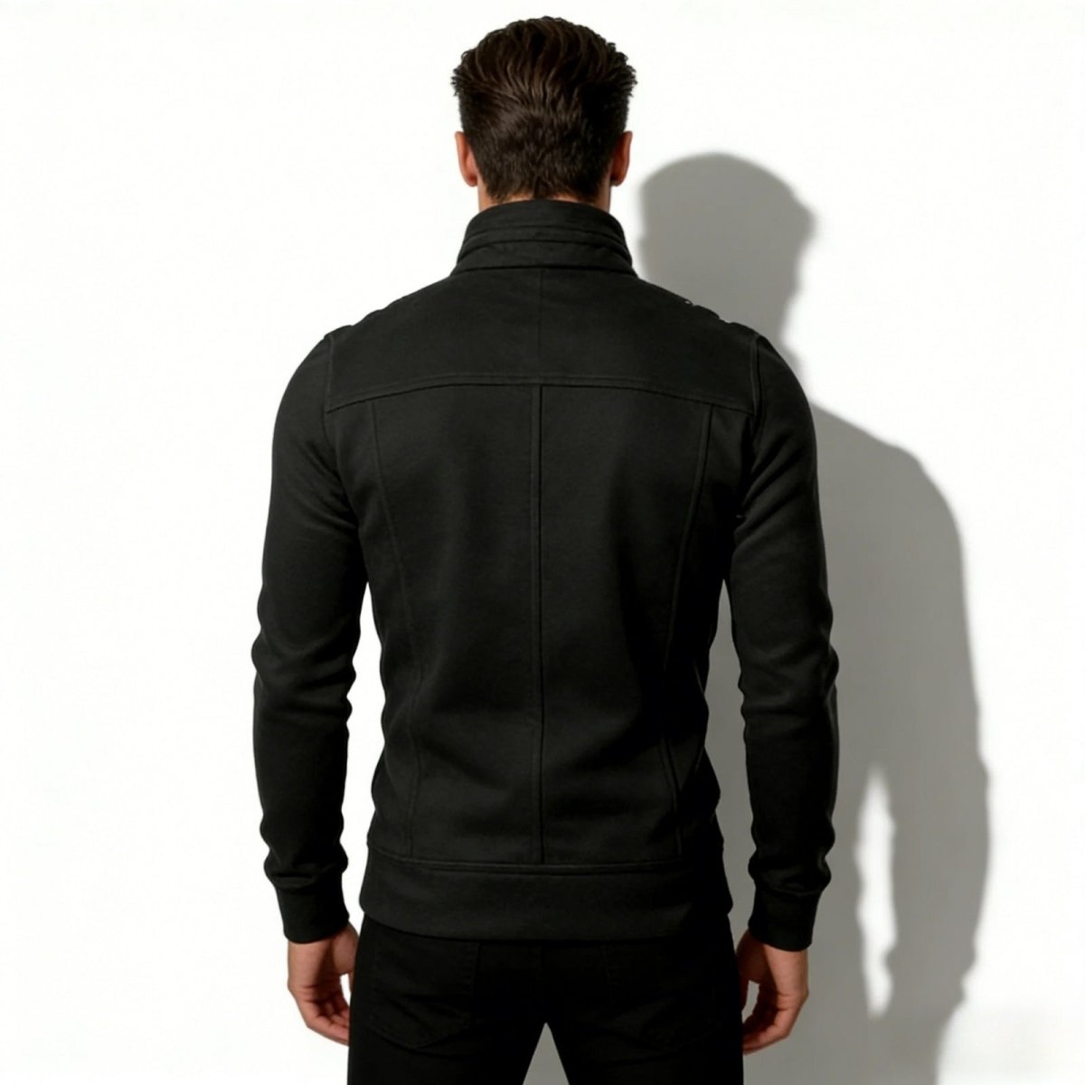 Back view of the Kouvr Kent men's black jacket, highlighting the shoulder construction and clean seam lines.