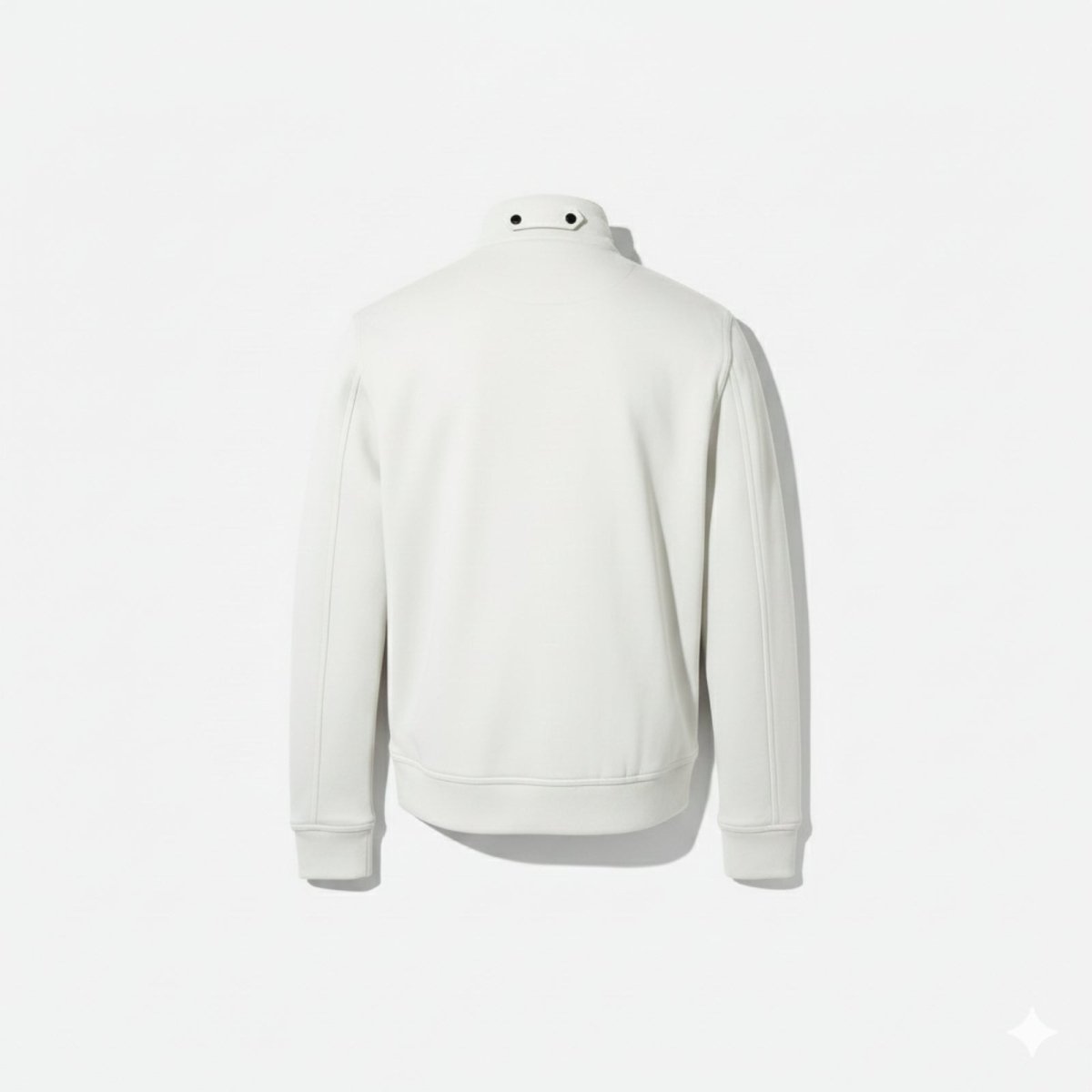 Flat lay of the back of the Kouvr Kent white jacket, displaying the snap button detail on the collar and the minimalist panel design.