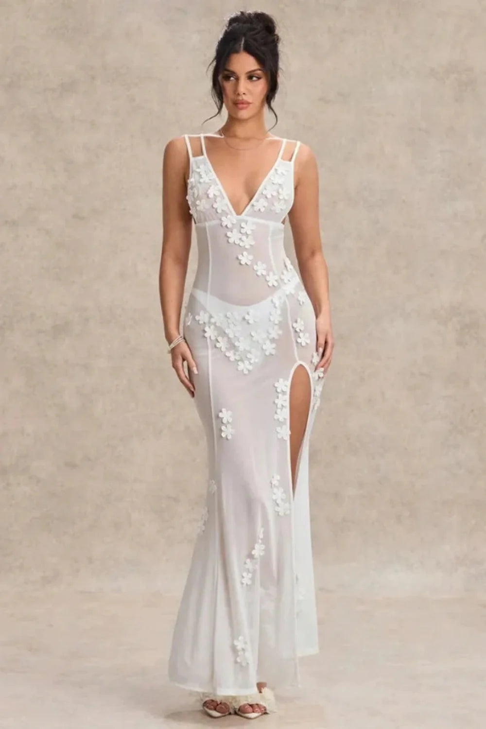 Kouvr Fashion Lila sheer white maxi dress with 3D floral appliqués and a high thigh slit