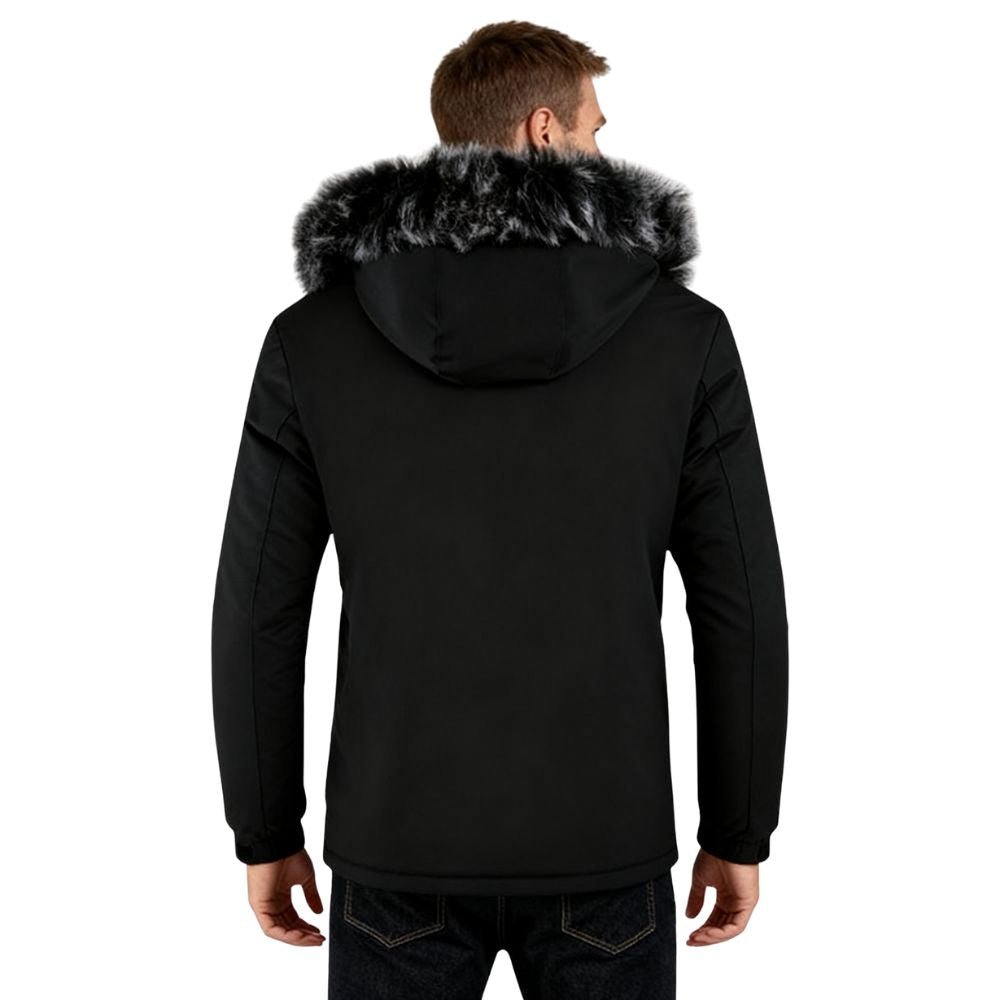 Black kouvr parka with fur hood worn by a person on a white background