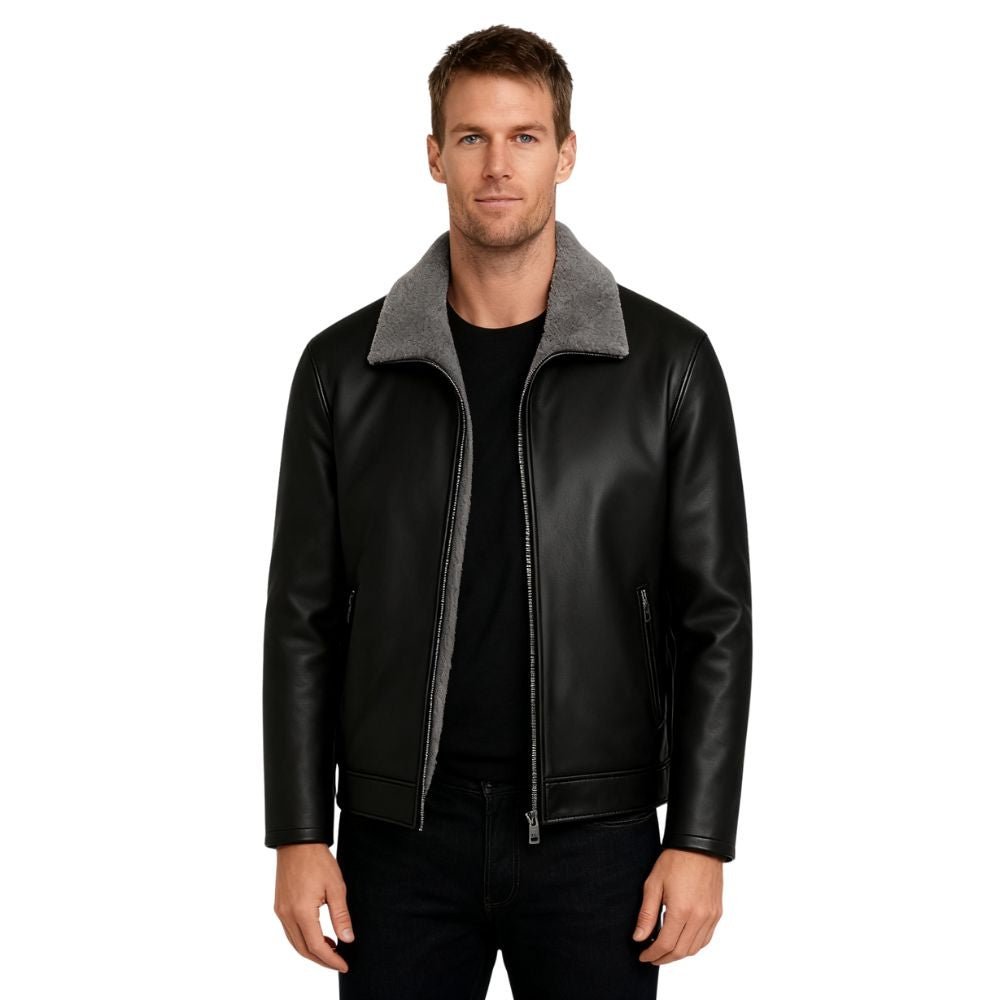 Man wearing a black kouvr leather jacket with gray collar on a white background