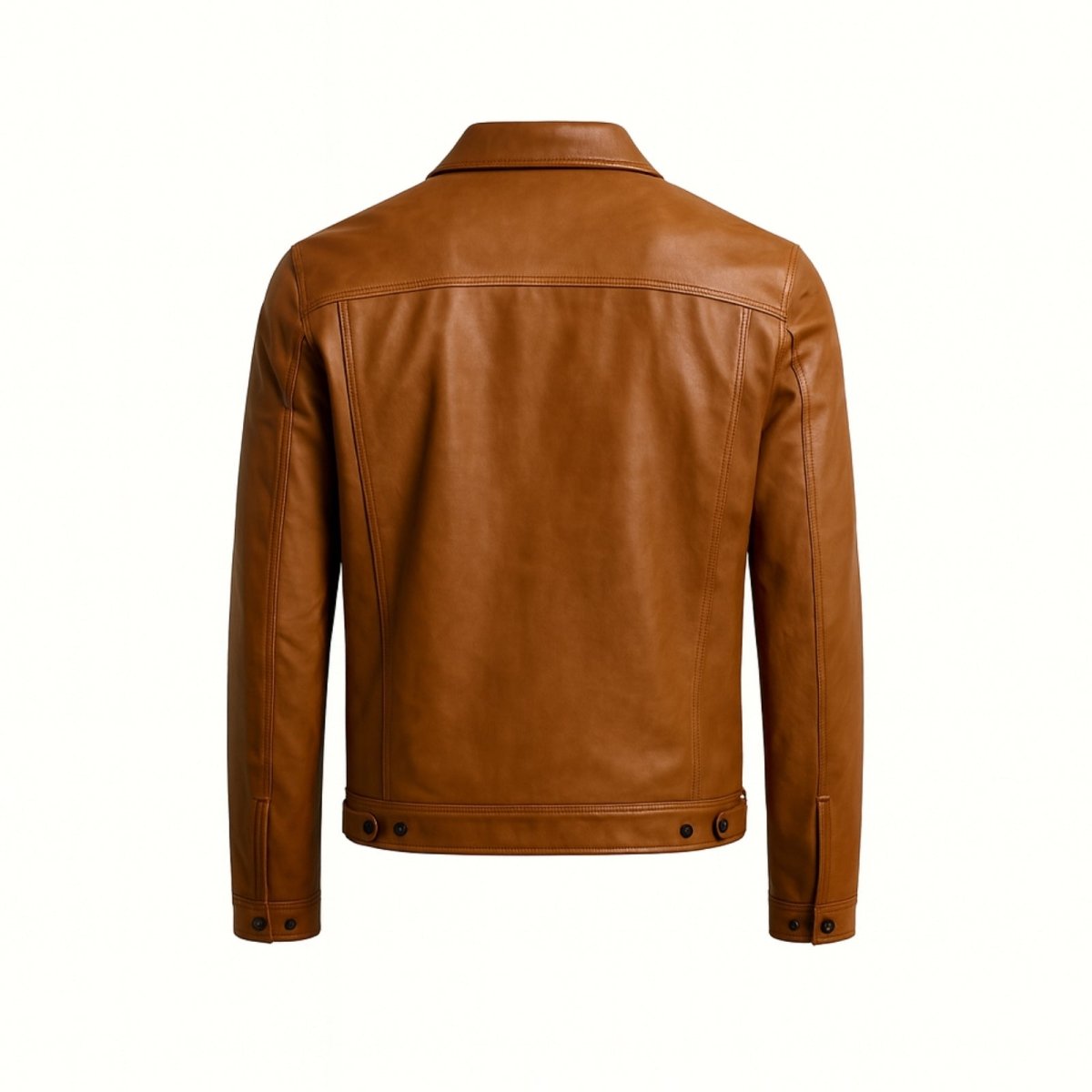 Flat lay product shot of the back of the Kouvr brown leather trucker jacket, detailing the stitching and clean lines.