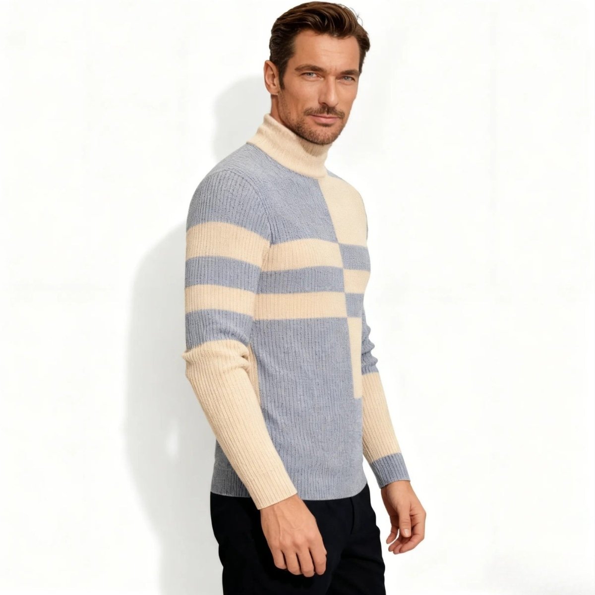Side profile of a man in the Kouvr Fashion designer ribbed knit turtleneck showing the long sleeve and geometric pattern detail.