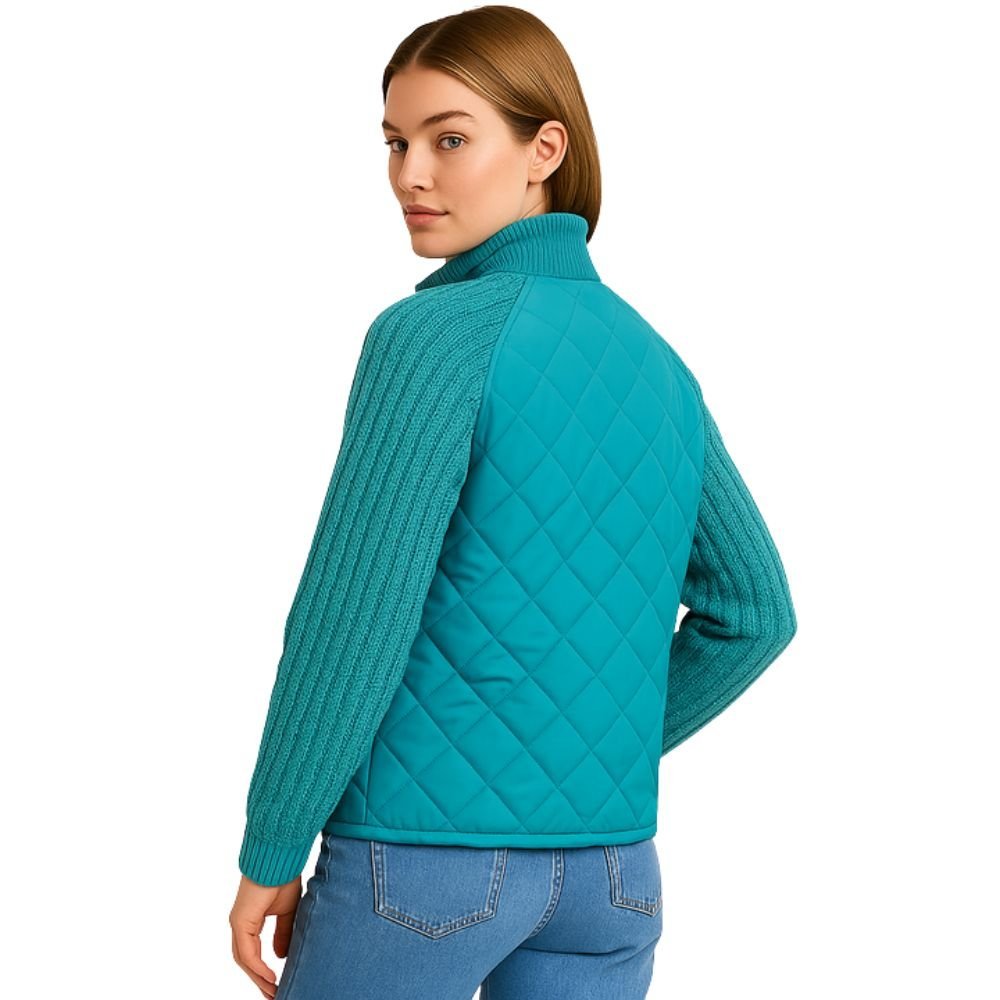 Model wearing the Kouvr Arlington Quilted Hybrid Jacket with blue jeans