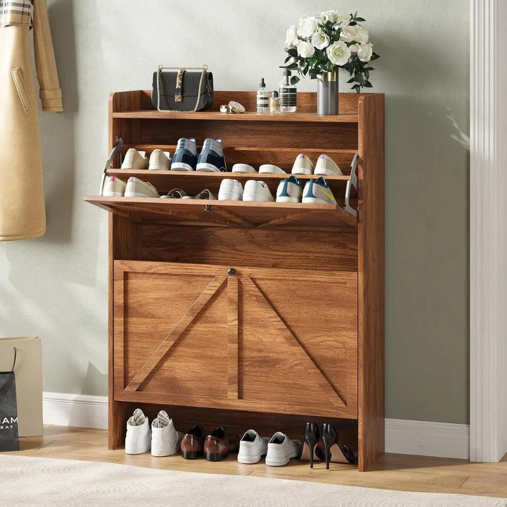 Wooden Kouvr shoe cabinet with open door displaying shoes and closed door with shoes underneath, against a neutral wall.