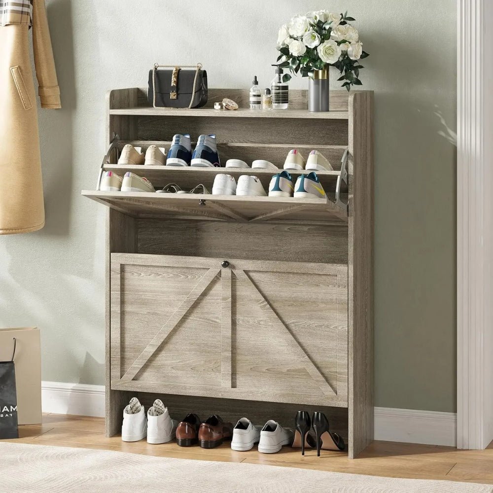 Wooden Kouvr shoe cabinet with open door displaying shoes and closed door with shoes on the floor.