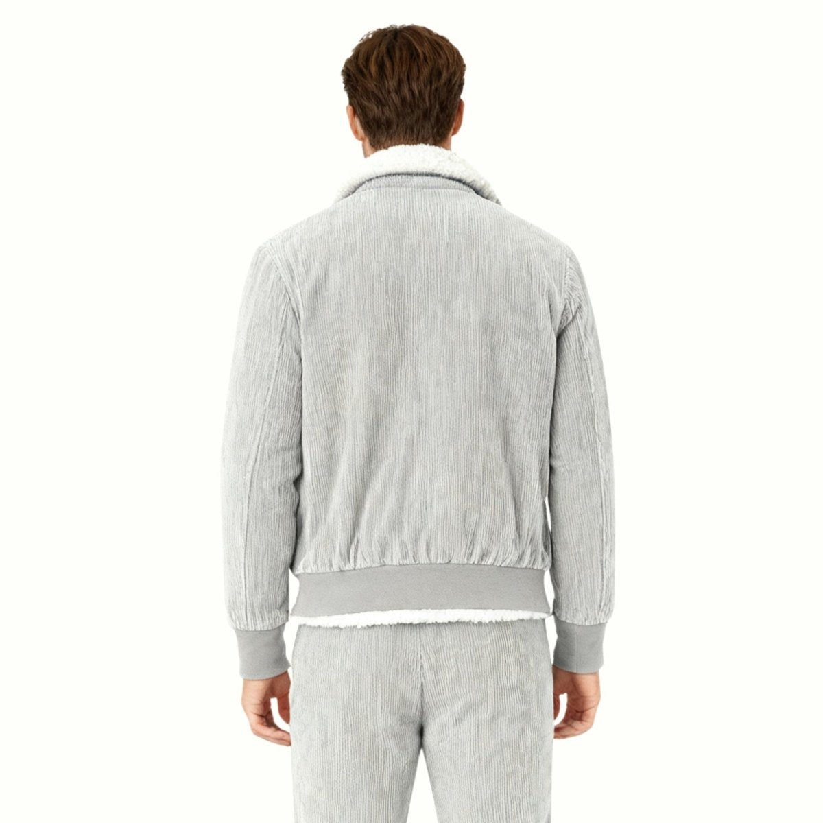 Back view of a men's grey ribbed corduroy jacket with ribbed hem and cuffs.