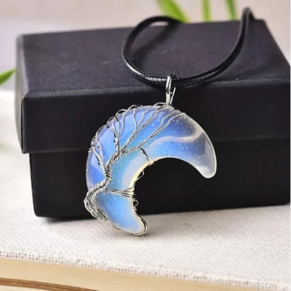 Kouvr Quartz Crescent Moon Necklace with a sterling silver wire wrapped Tree of Life
