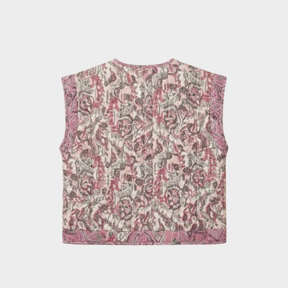 Flat lay product photograph of the back of the Kouvr Fashion Rose quilted vest, showing the full scope of the artisanal paisley and floral jacquard fabric.