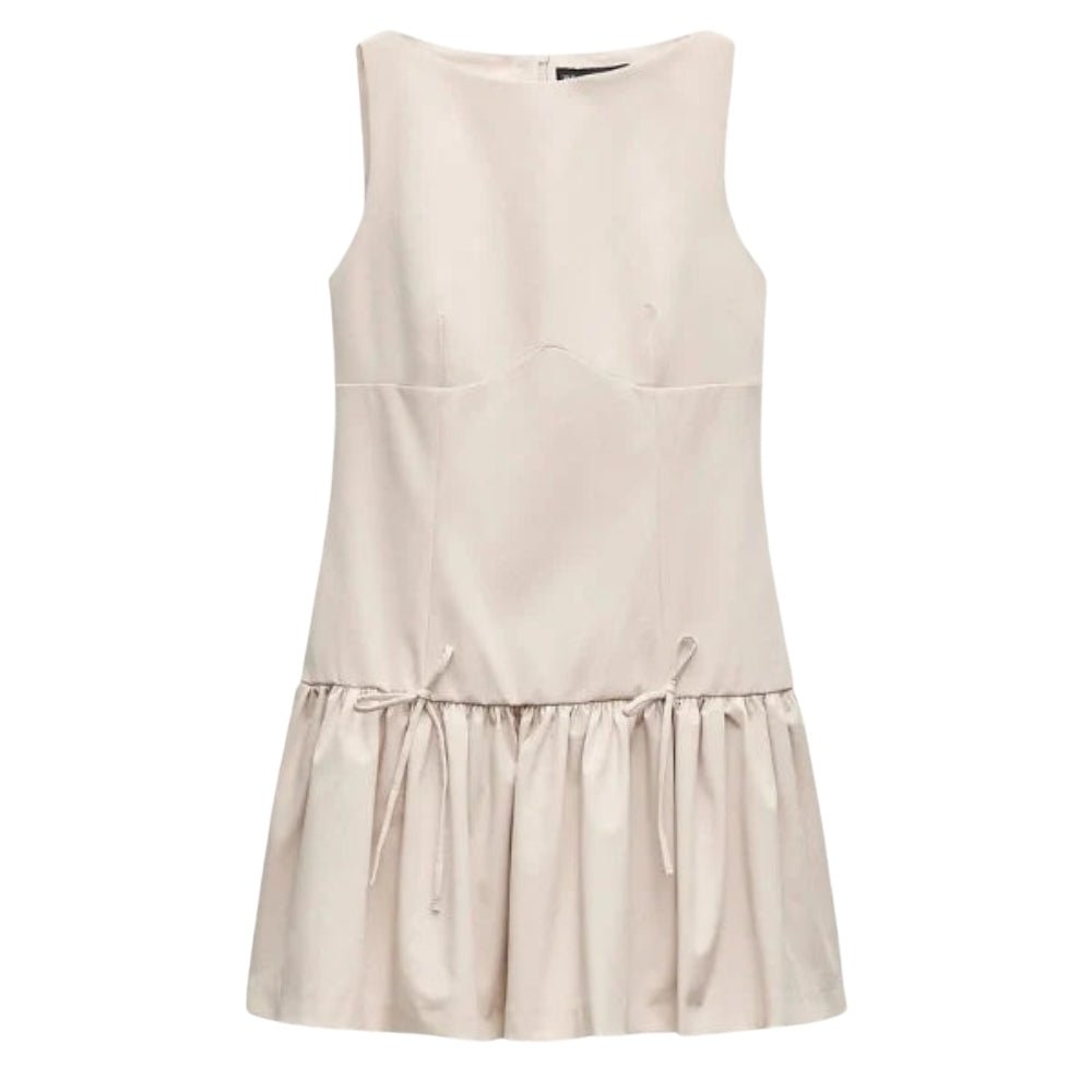 Ivory Kouvr sleeveless dress on a white background