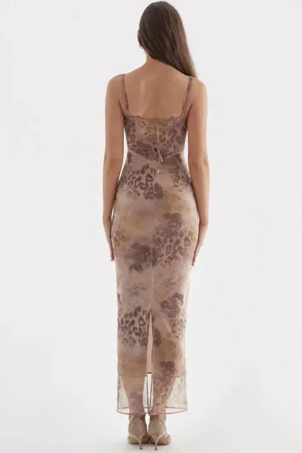 Model wearing Kouvr shaira beige floral corset maxi dress with lace trim for a formal event