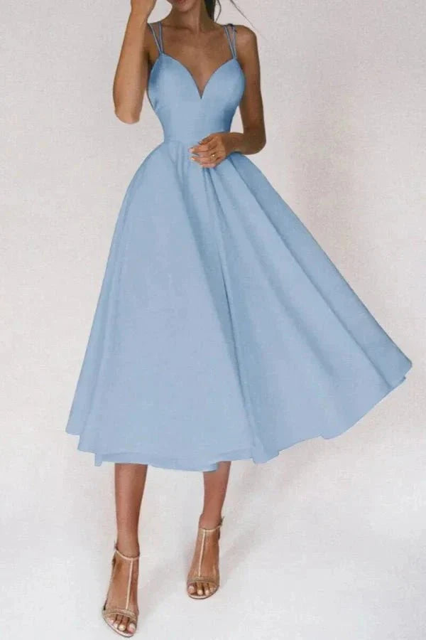 Weave semantically related terms throughout the description: "elegant silhouette," "flowing skirt," "sophisticated attire," "ceremony guest," "reception dress," and "special occasion