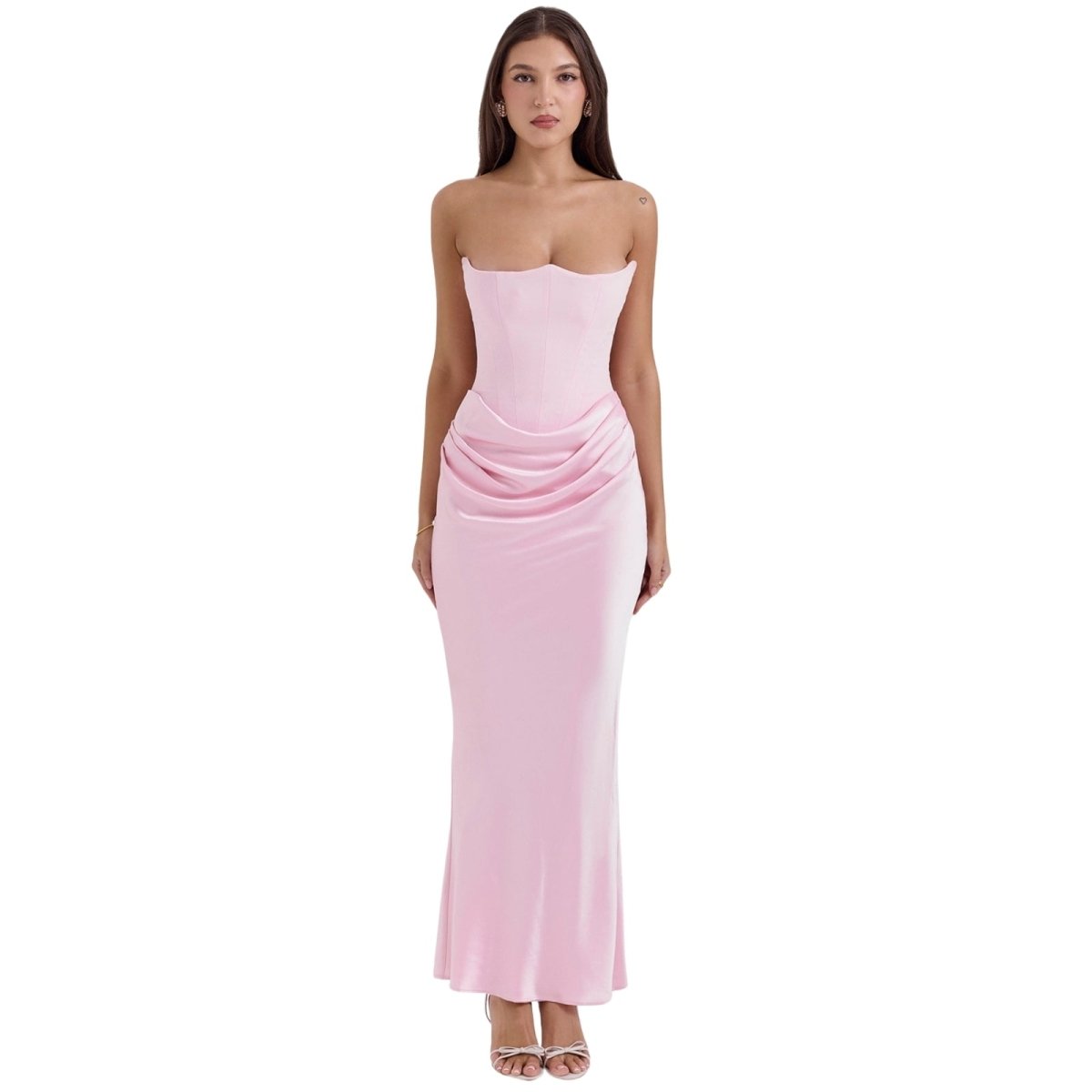Woman wearing a pink Kouvr strapless gown on a white background