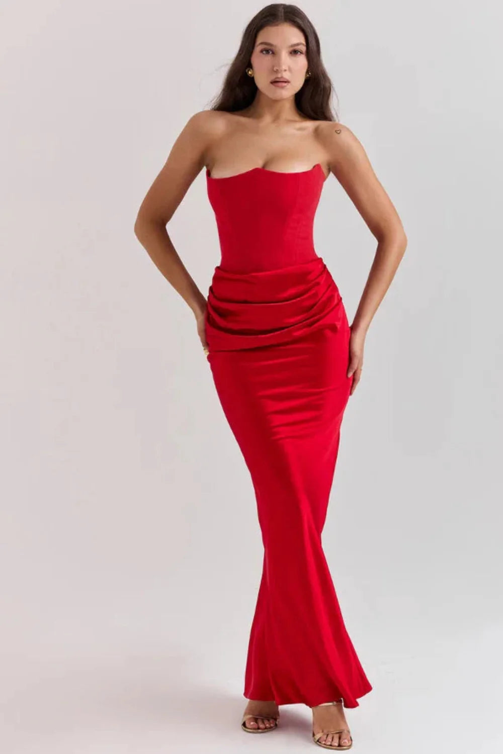structured bodice," "draped silhouette," "bustier," "formal wear," and "black-tie attire