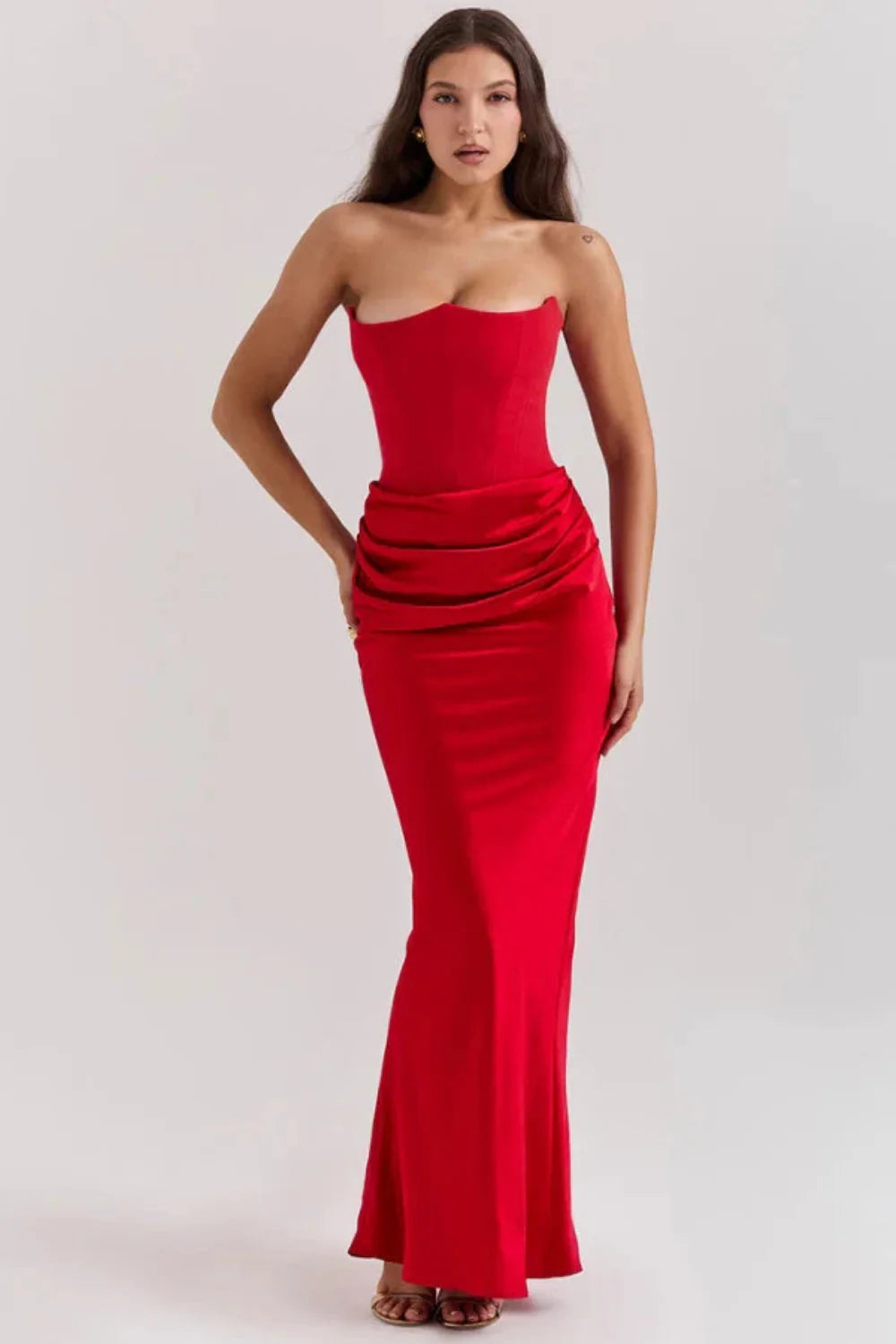 structured bodice," "draped silhouette," "bustier," "formal wear," and "black-tie attire