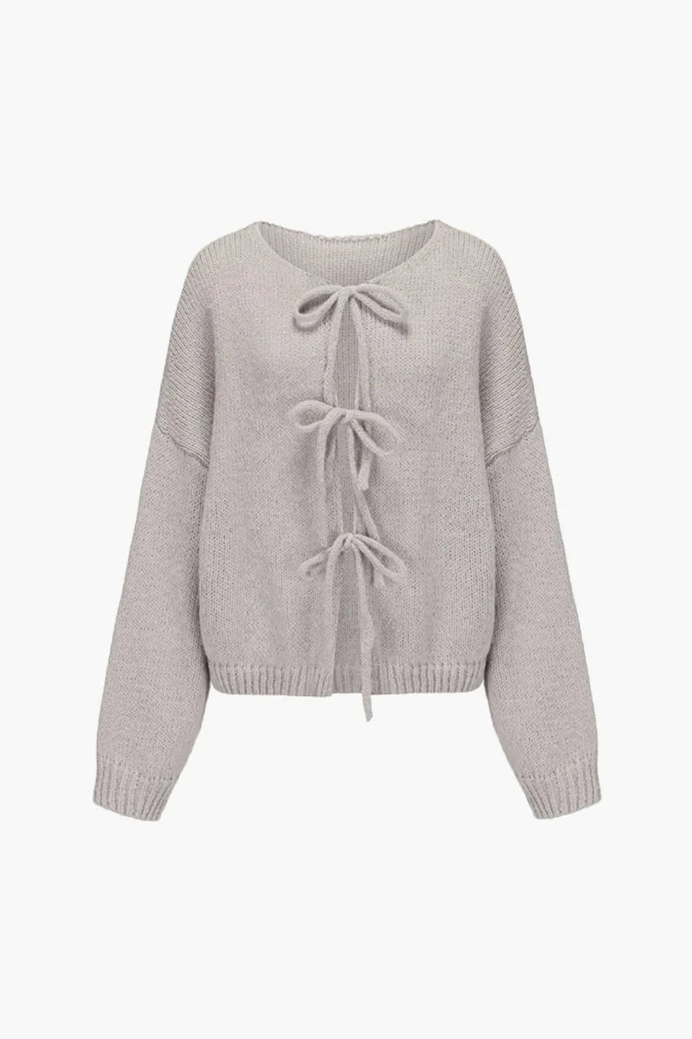 coquette aesthetic', 'slouchy fit', 'balloon sleeve', 'cropped sweater', 'luxury knitwear', 'soft layering piece', and 'transitional knit