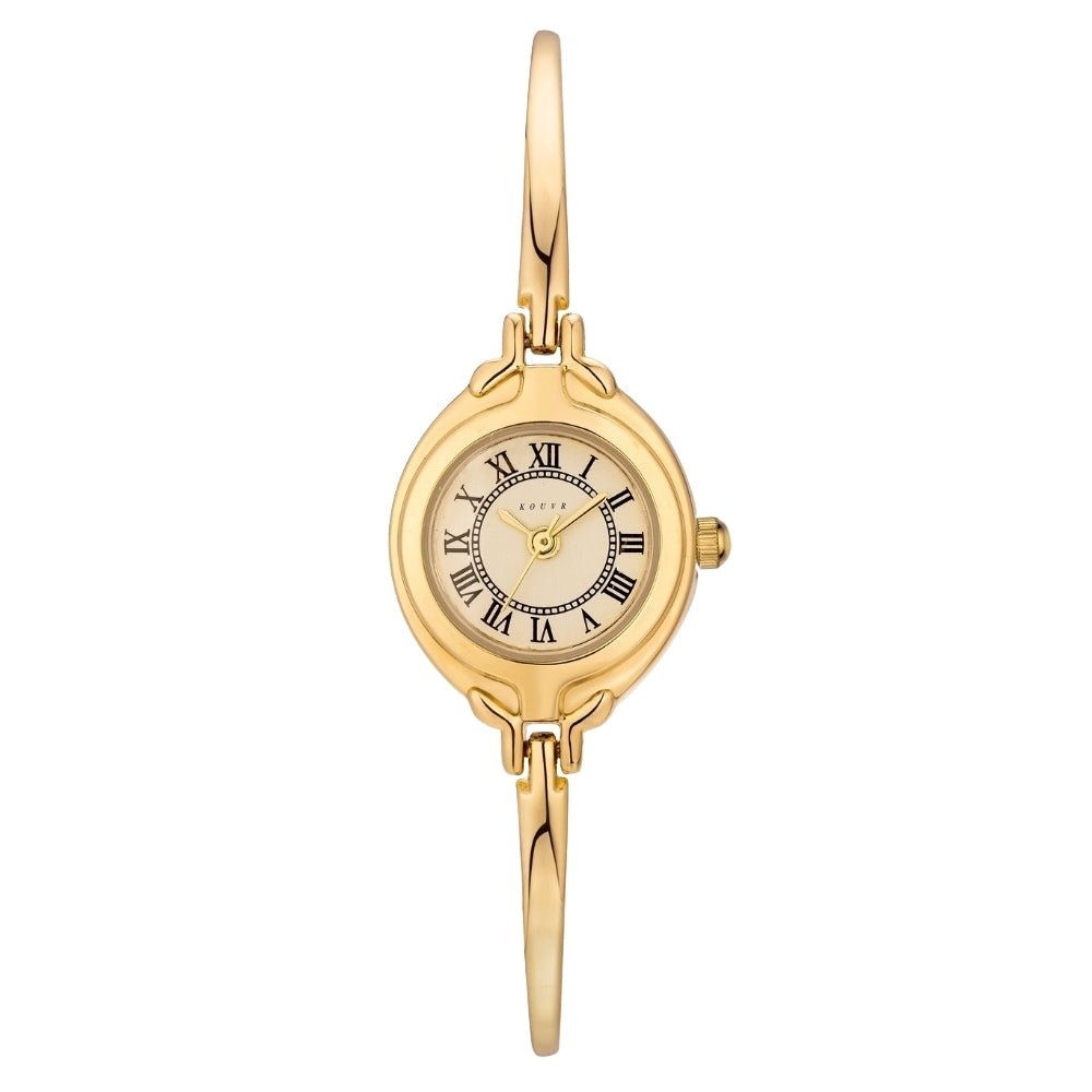 Gold Kouvr bangle watch with a white face and black Roman numerals on a white background