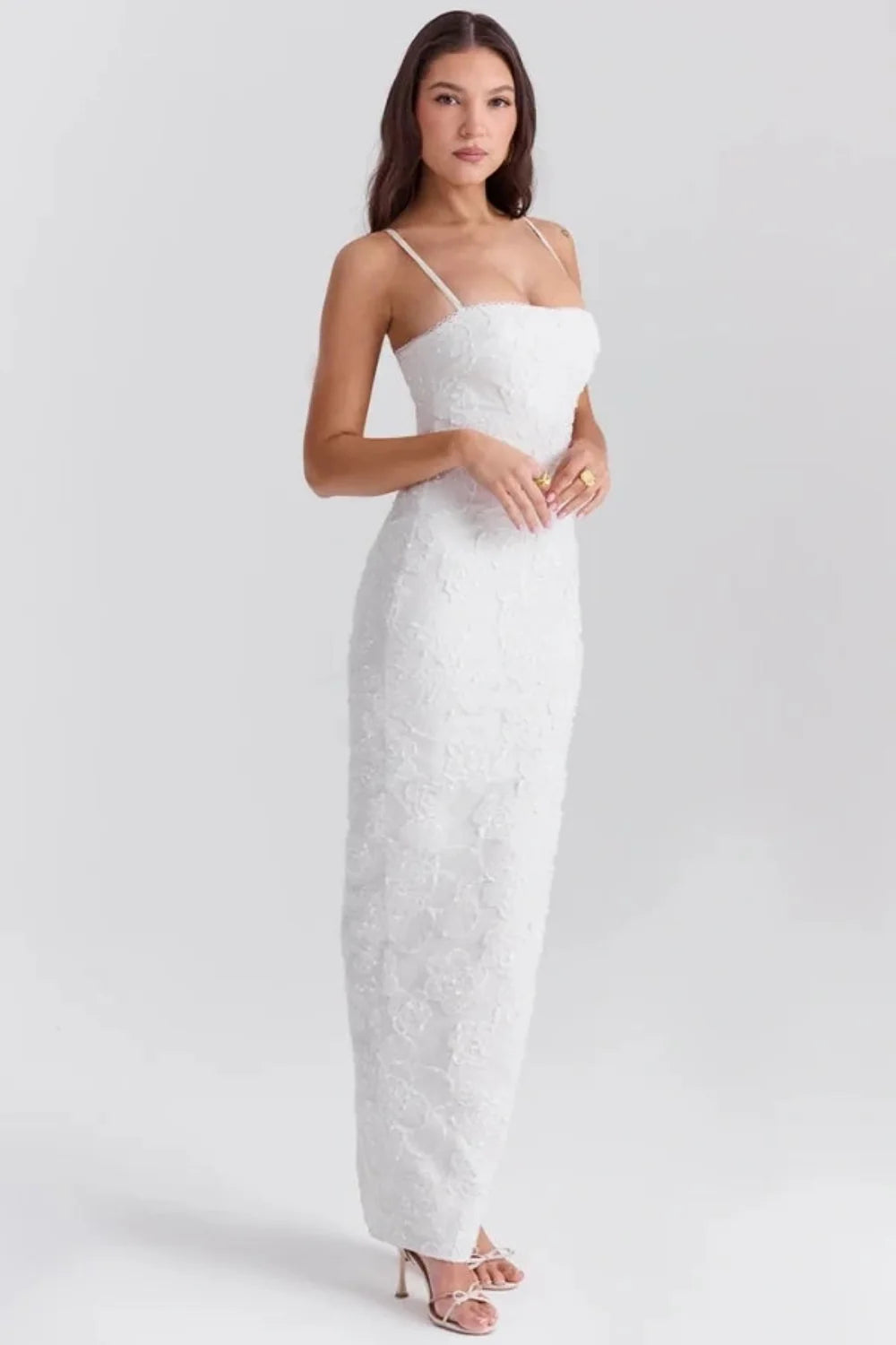 sculptural silhouette," "couture detailing," "ethereal elegance," "minimalist bride," "civil ceremony attire," and "rehearsal dinner outfit