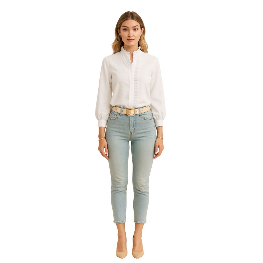 Model wearing the Kouvr Fashion Ruffle Neck Blouse, tucked into high-waisted light-wash jeans