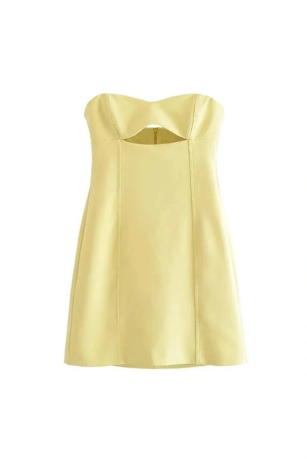 Model wearing the Kouvr Fashion yellow strapless cutout mini dress from the front