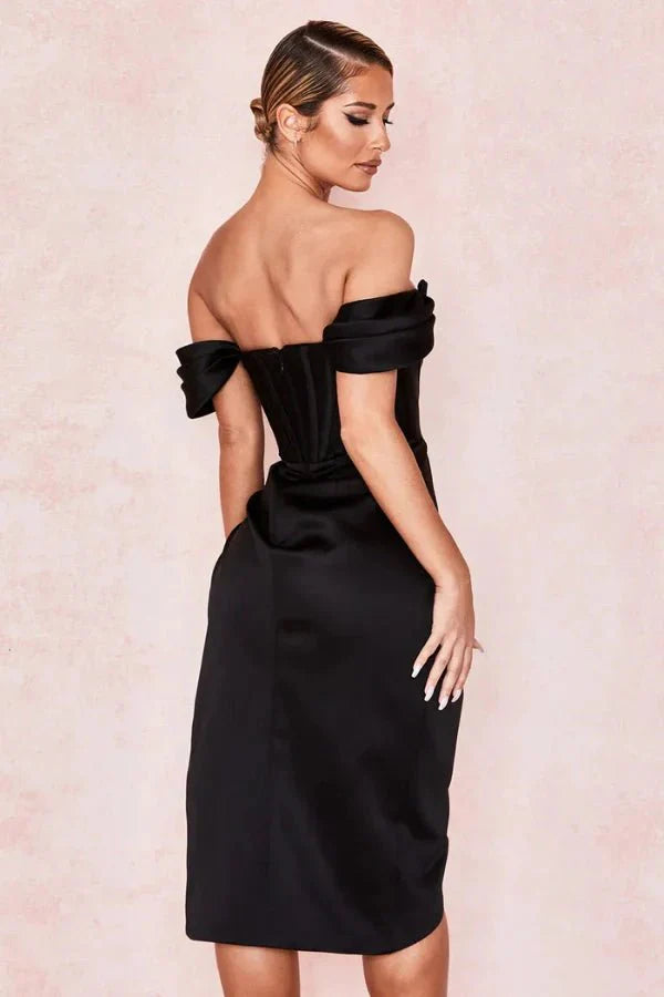 structured bodice, bardot neckline, asymmetric hem, sculpted silhouette, and couture-inspired draping