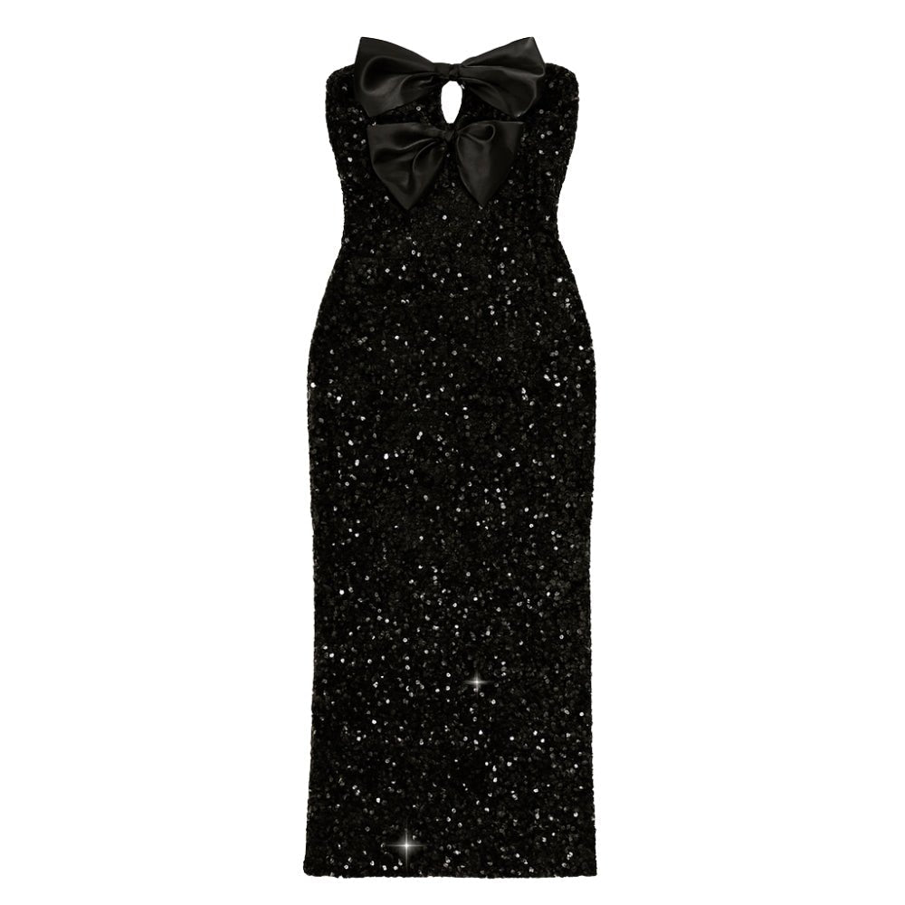 Black Kouvr glitter dress with a large bow on a white background
