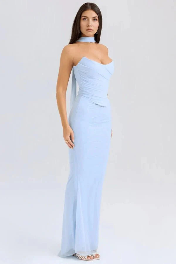 Side profile of the Hailey light blue evening gown, detailing the ruched silhouette and the connection of the choker scarf at the neck.