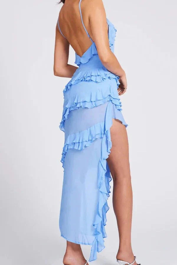 Model wearing Kouvr Aiah light blue asymmetric ruffle midi dress for a cocktail event