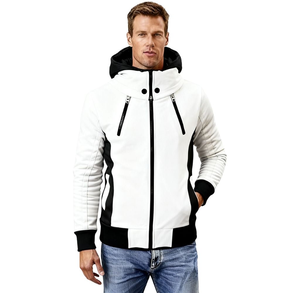 Man wearing a white and black kouvr jacket with a hood on a white background